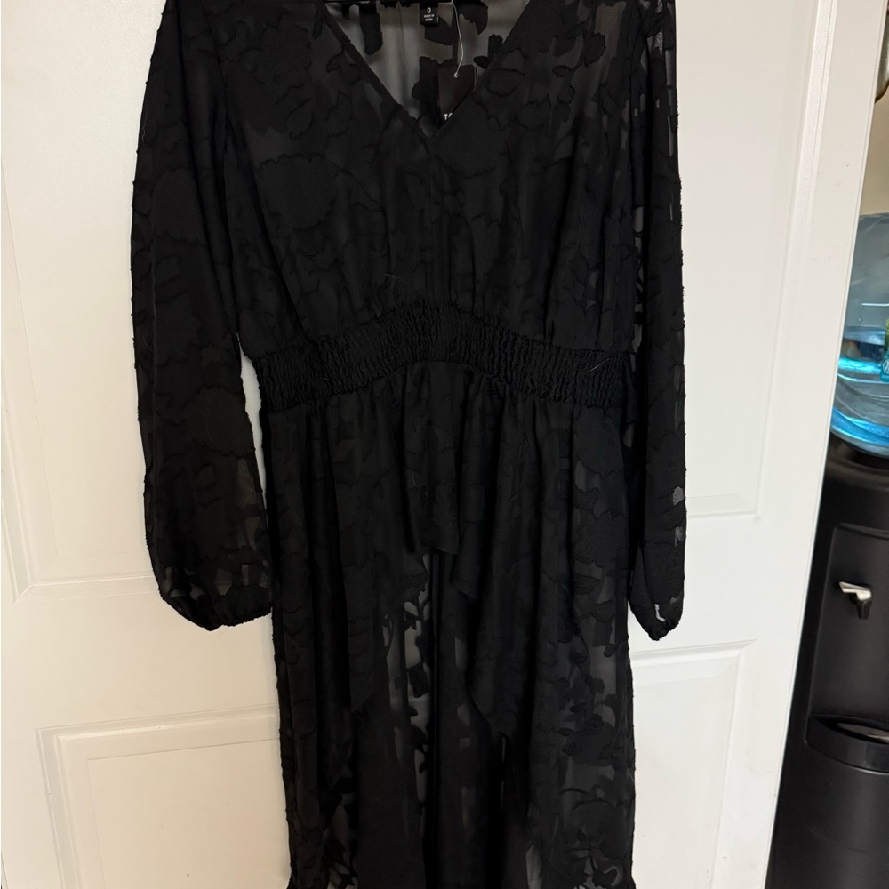Stylish Black Sheer high low top new with tags!
